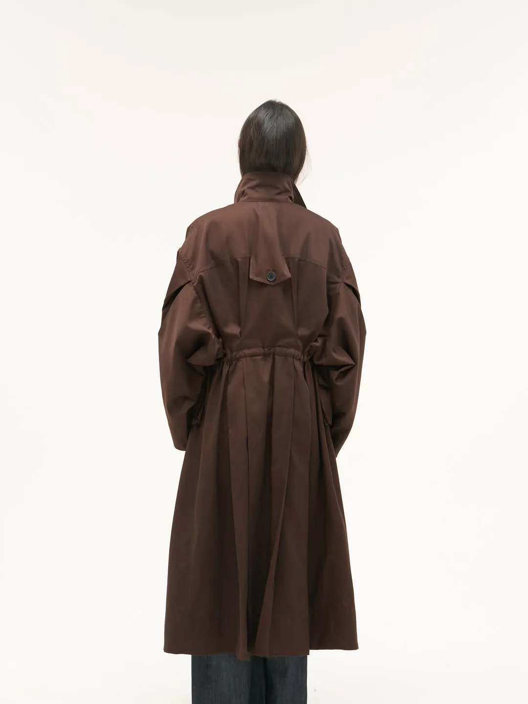 Trench coat in brown, back view